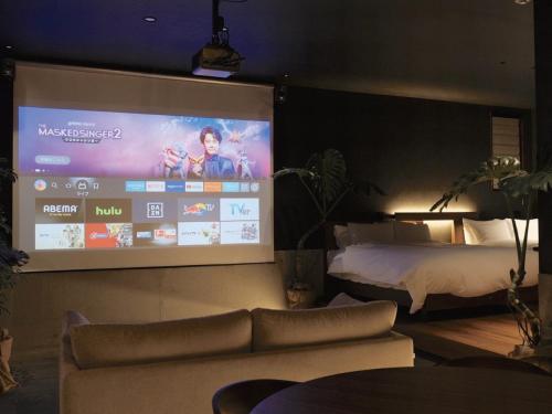 TV a/nebo společenská místnost v ubytování LAVA SAUNA &VILLA