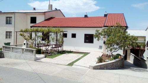 Apartments with parking space Senj - 7475
