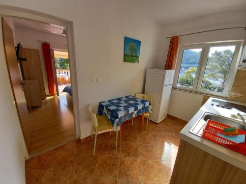 Kuchyň nebo kuchyňský kout v ubytování Apartments by the sea Sobra, Mljet - 7531
