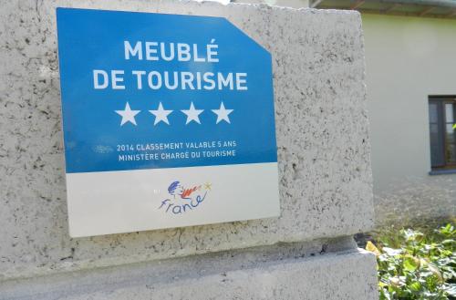 a sign on a wall that reads mobile de touphrine at Gîte La Grenouillère in Esquéhéries