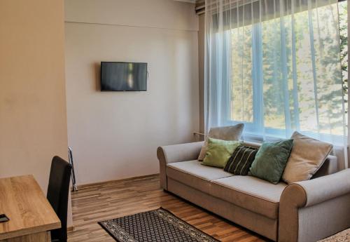 TV a/nebo společenská místnost v ubytování Citystop Majutuskeskus