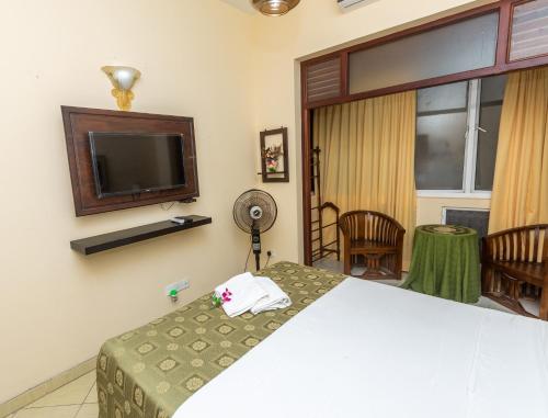 Cama o camas de una habitación en Fort Thari Inn