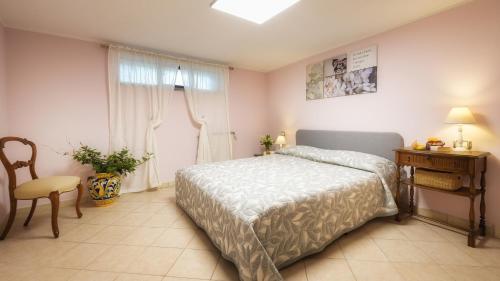 Postel nebo postele na pokoji v ubytování Villa Sylva 6&2, Emma Villas