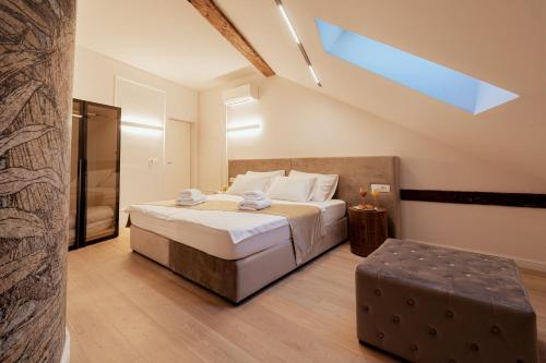 Postel nebo postele na pokoji v ubytování Trecento Boutique Rooms