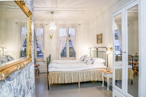 Postel nebo postele na pokoji v ubytování Gloppen Hotell - by Classic Norway Hotels