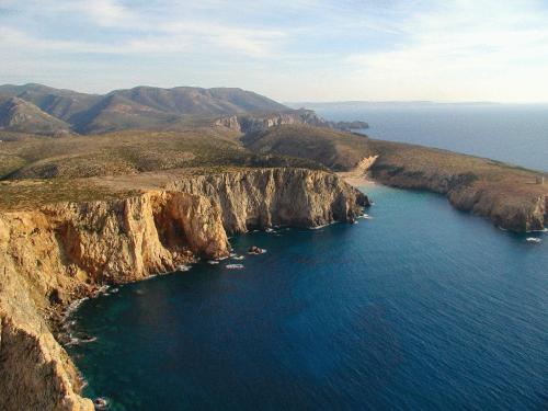 an aerial view of a large body of water at Hotel Perda Rubia in San Giovanni Suèrgiu