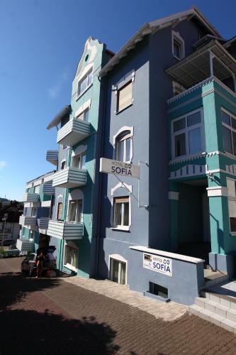 a blue building with a sign in front of it at Hotel Sofia in Bad Wildungen