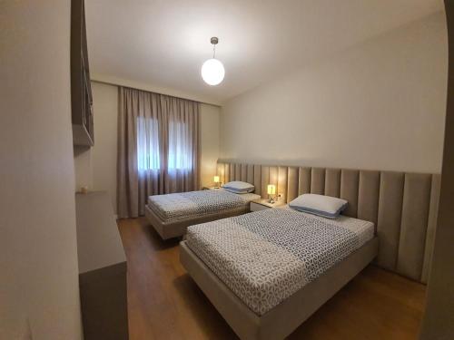 Krevet ili kreveti u jedinici u okviru objekta Four Seasons Vlora