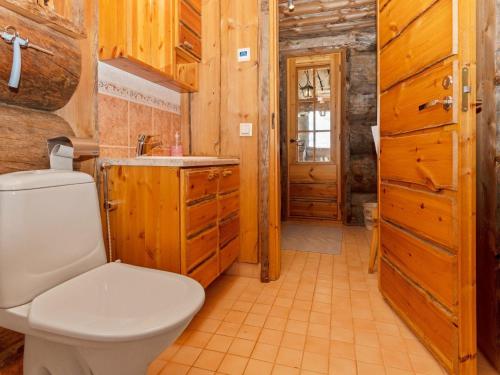 a bathroom with a toilet and a sink at Holiday Home Kitka-nokkela by Interhome in Ruka
