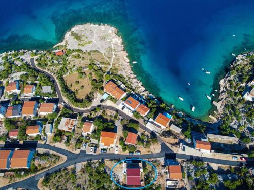 an aerial view of a resort next to the ocean at Holiday Home Emili & Elias by Interhome in Karlobag