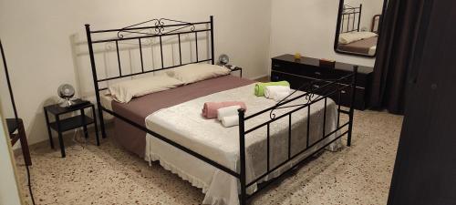 Katil atau katil-katil dalam bilik di MARANZANO VACANZE Casa con Giardino