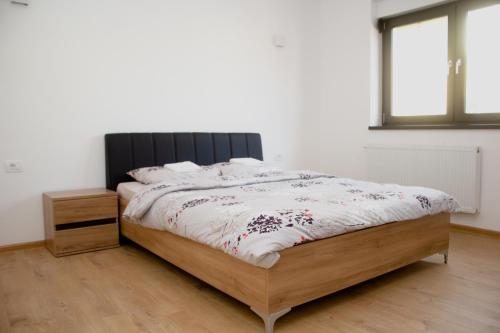 Postel nebo postele na pokoji v ubytování Apartments Swiss Travnik