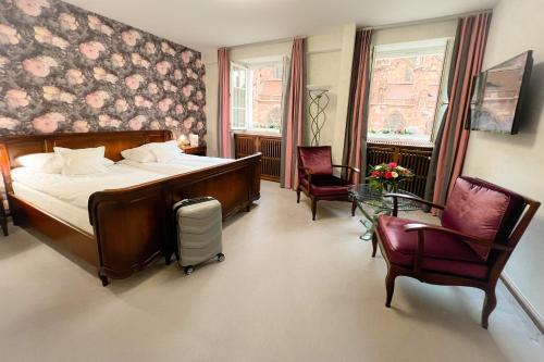 Postelja oz. postelje v sobi nastanitve Boutiquehotel Oberkirch im Zentrum