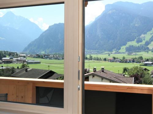 a view from a window with mountains in the background at Apartment Geislerhof by Interhome in Ramsau