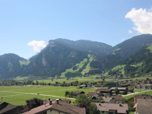 a town in a valley with mountains in the background at Apartment Geislerhof by Interhome in Ramsau