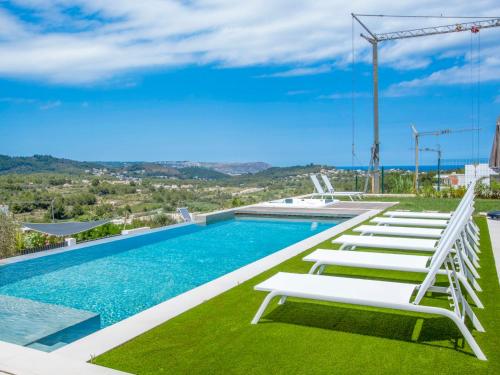 Bazén v ubytování Villa Villa Atina by Interhome nebo v jeho okolí