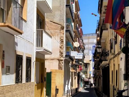 an alley in a city with buildings at Holiday Home Rainbow by Interhome in Benidorm