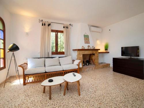 TV a/nebo společenská místnost v ubytování Holiday Home La Marina by Interhome