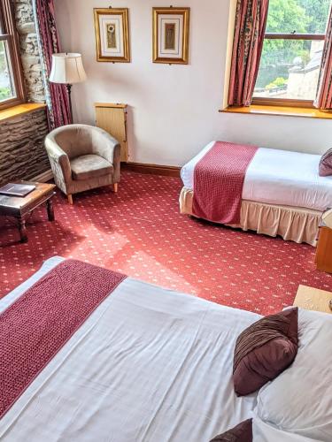 Ένα ή περισσότερα κρεβάτια σε δωμάτιο στο Whitewater Hotel & Spa