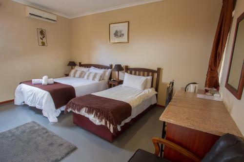 Cama o camas de una habitación en Ramasibi Guest Services
