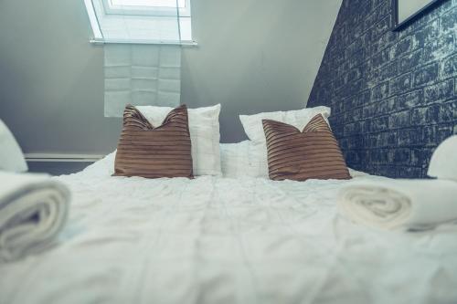 Posteľ alebo postele v izbe v ubytovaní Le loft superbe studio avec stationnement gratuit