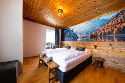 Ένα ή περισσότερα κρεβάτια σε δωμάτιο στο Bergmoment