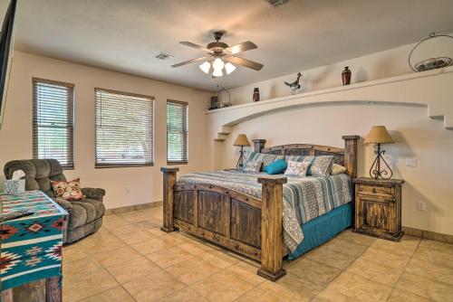 a bedroom with a bed and a ceiling fan at Rustic Las Cruces Escape - 2 Mi to NMSU! in Las Cruces