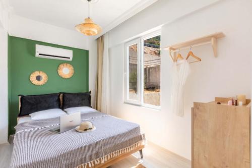 Postel nebo postele na pokoji v ubytování Voila Suites 1+1 Deniz Manzaralı (Sea View)