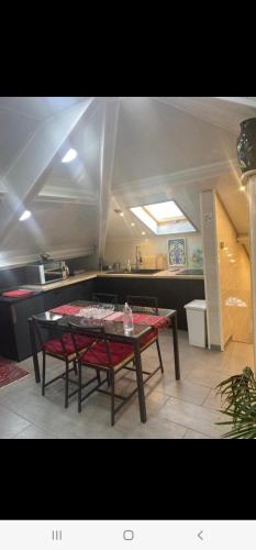 Kuchyň nebo kuchyňský kout v ubytování Appartement T LUXE
