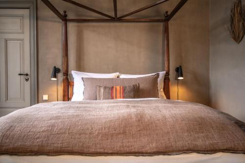 Ein Bett oder Betten in einem Zimmer der Unterkunft Gutshaus Zarchlin