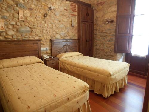 Postel nebo postele na pokoji v ubytování Hostal Virgen de la Encina