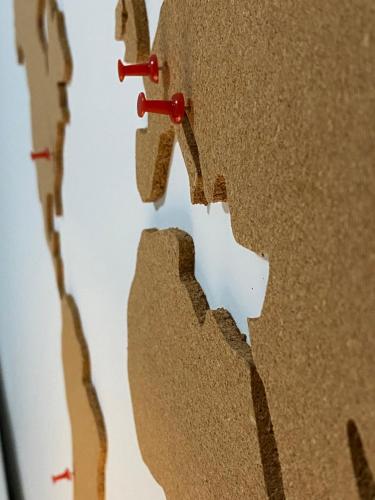 a paper cut out of a man with red nails at Apartment Centar Višnjik, Zadar in Zadar