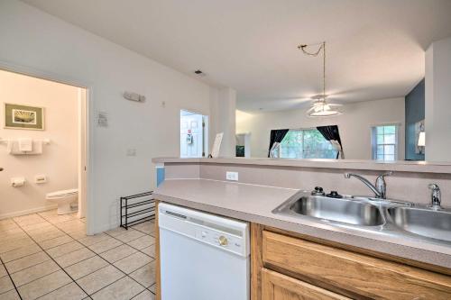 a kitchen with a sink and a toilet in a room at Family-Friendly Lake Berkeley Resorts Home! in Kissimmee