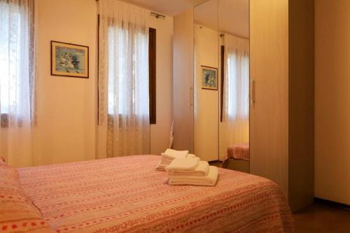 Postel nebo postele na pokoji v ubytování Tenuta da Mosè con vista sui colli asolani