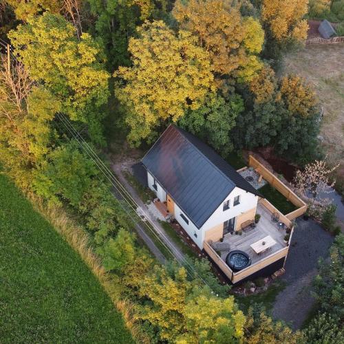 an aerial view of a house in the woods at Chata Fraluq in Tatobity