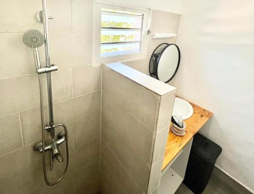 Ένα μπάνιο στο Superbe T2 full équipé à sada avec vue sur îlot