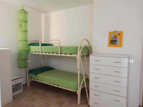Postel nebo postele na pokoji v ubytování Casa Gialla