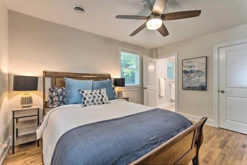 a bedroom with a bed and a ceiling fan at Stylish Wilmington Home, 2 Mi to Riverwalk! in Wilmington