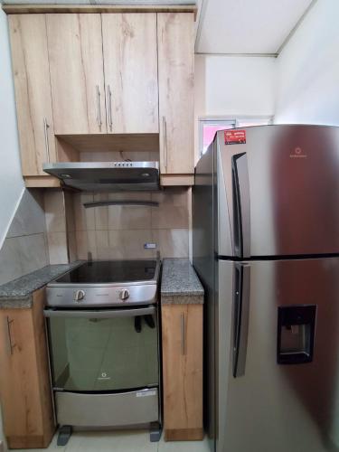 Una cocina o cocineta en Metrópolis Apartaments for Rent