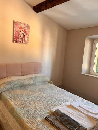 Postel nebo postele na pokoji v ubytování Chianti chic