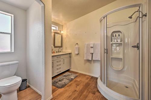 a bathroom with a shower and a toilet and a sink at Arizona Room, Gas Grill Charming Payson Home! in Payson