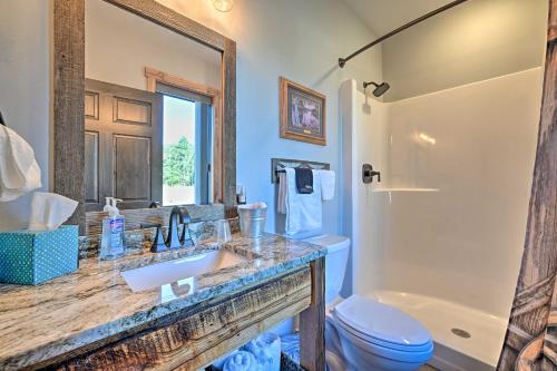 a bathroom with a sink and a toilet and a tub at Massive Hatfield Loon Lodge with Roller Rink in Hatfield