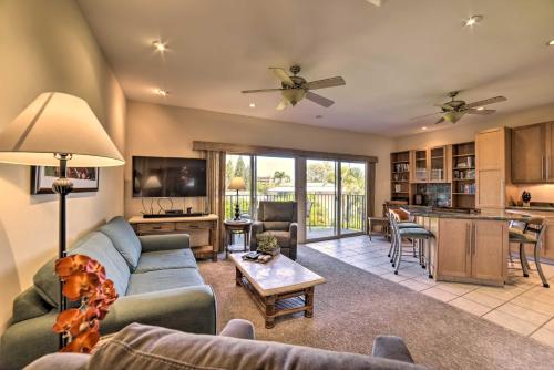 a living room with a couch and a table at Gorgeous Oceanfront Kihei Condo with Balcony! in Wailea