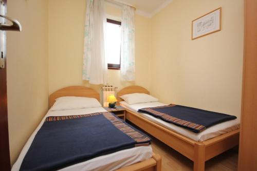 Apartments with a parking space Mali Losinj (Losinj) - 7939