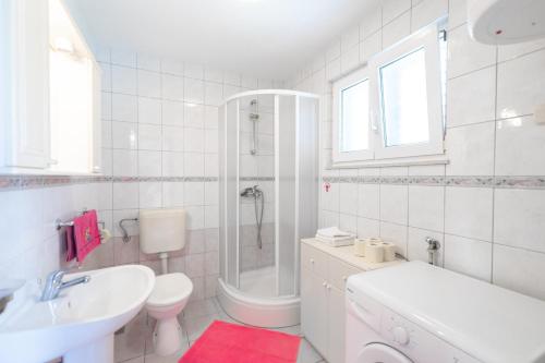 A bathroom at Apartments by the sea Cove Gradina, Korcula - 9273
