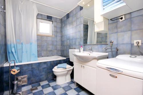 Et badeværelse på Apartments by the sea Lumbarda, Korcula - 9172