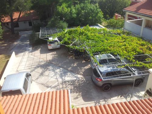 an aerial view of a car parked in a parking lot at Apartment Nerezine 8049b in Nerezine