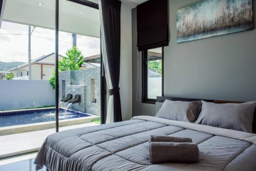 Postel nebo postele na pokoji v ubytování 2 Bed Contemporary Pool Villa