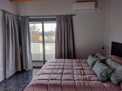 Фотография из галереи Apartamento Agur cerca del Arena Stadium в городе Майпу