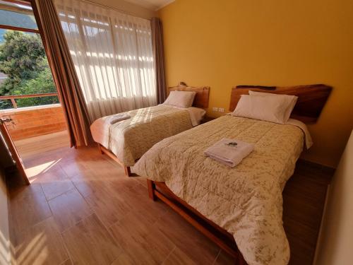 Postel nebo postele na pokoji v ubytování Pampa Bella Lodge